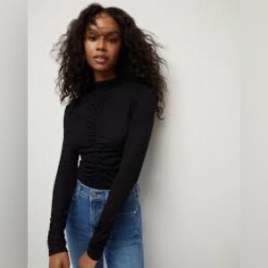 Goldie long sleeve black ruched in the middle and ribbed style. Size XS.
